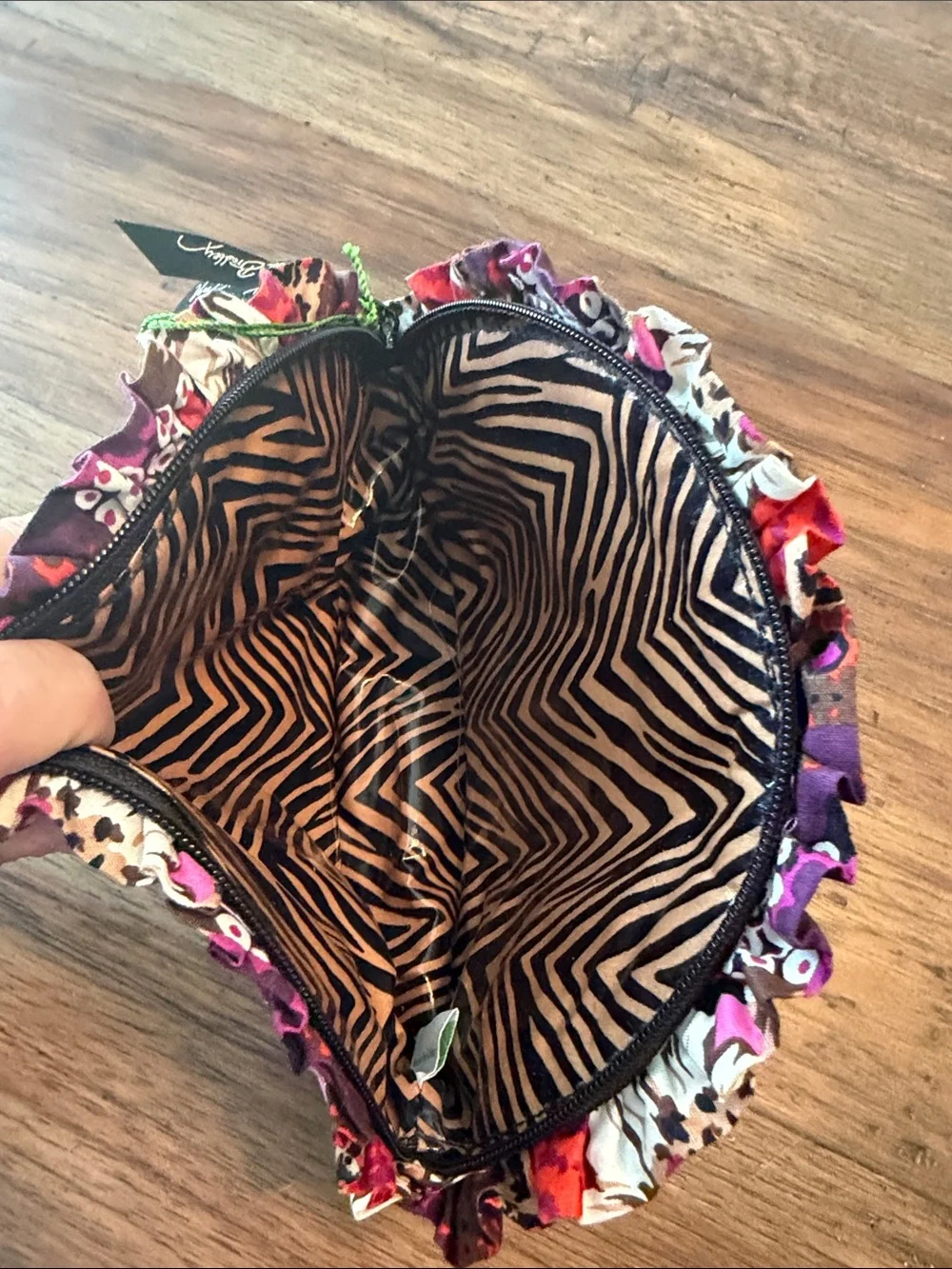 Vera Bradley small makeup bag.